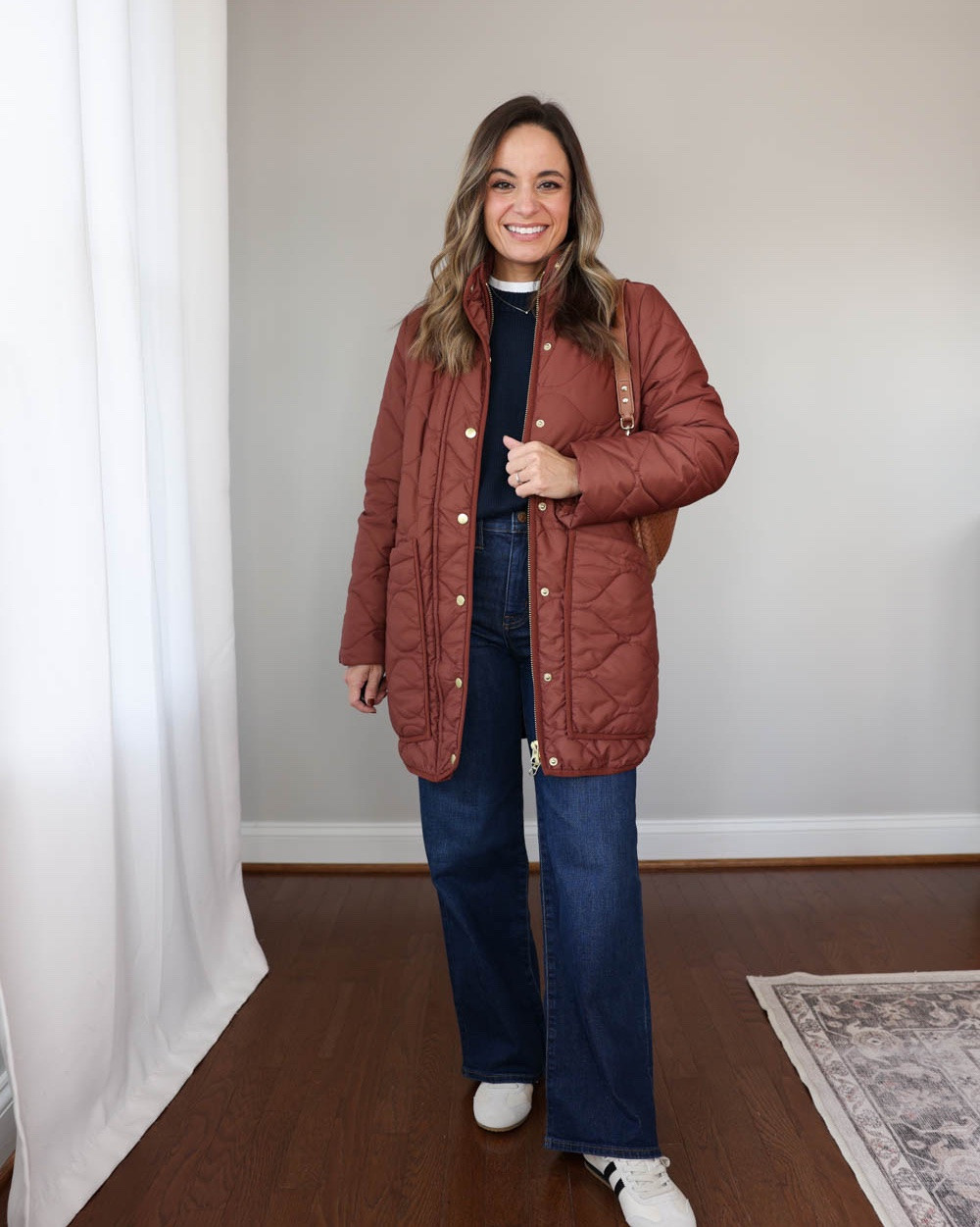 Petite-friendly outfit ideas with jeans and sneakers!

Outfit 1:
Jacket (Quince): xs in redwood brown (sleeves cuffed)
Sweater (Quince): xs
Jeans (J.Crew Factory): petite 24
T-shirt (Old Navy): petite xs
Sneakers (Quince): size up 1/2 size

Outfit 2:
Jeans (Levi’s): 25 x 27” on my honor wash / 12” rise / 27” inseam - sized up 
Sweater (Gap): petite xs 
T-Shirt (Old Navy): petite xs 
Sneakers (Quince): size up 1/2 size 

Outfit 3:
Field Jacket (Madewell): xxs
Brown Marled Sweater (Gap): petite xs
White T-Shirt (Old Navy): petite xs
Dark Wash Jeans (J.Crew Factory): petite 24 / 10” rise / 28” inseam
Sneakers (Gola): tts

My measurements for reference: I’m 4’10” and 105lbs. My bust, waist, and hip measurement is 32”, 24”, and 36”.