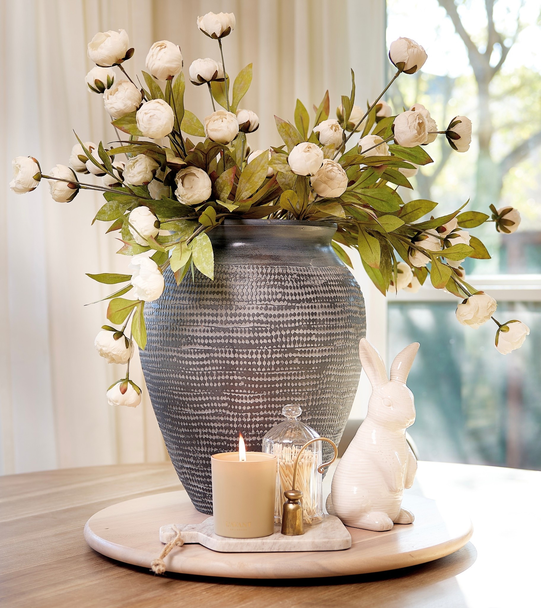 Sprinkling a lil Easter into my decor🤍

The mini marble cutting board is perfect tray for a candle and cloche.