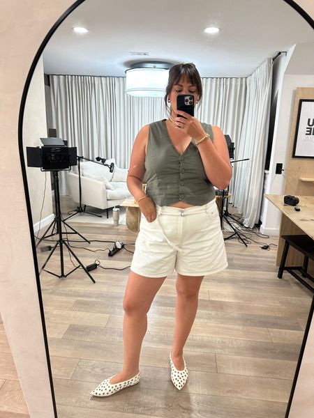Love a good vest moment 🩶 These shorts fit so well and are so comfortable! I love the relaxed look of them. 

summer outfit inspo, vest outfit, mid size, casual outfit, white shorts, vest 

#LTKcurves #LTKFind #LTKstyletip