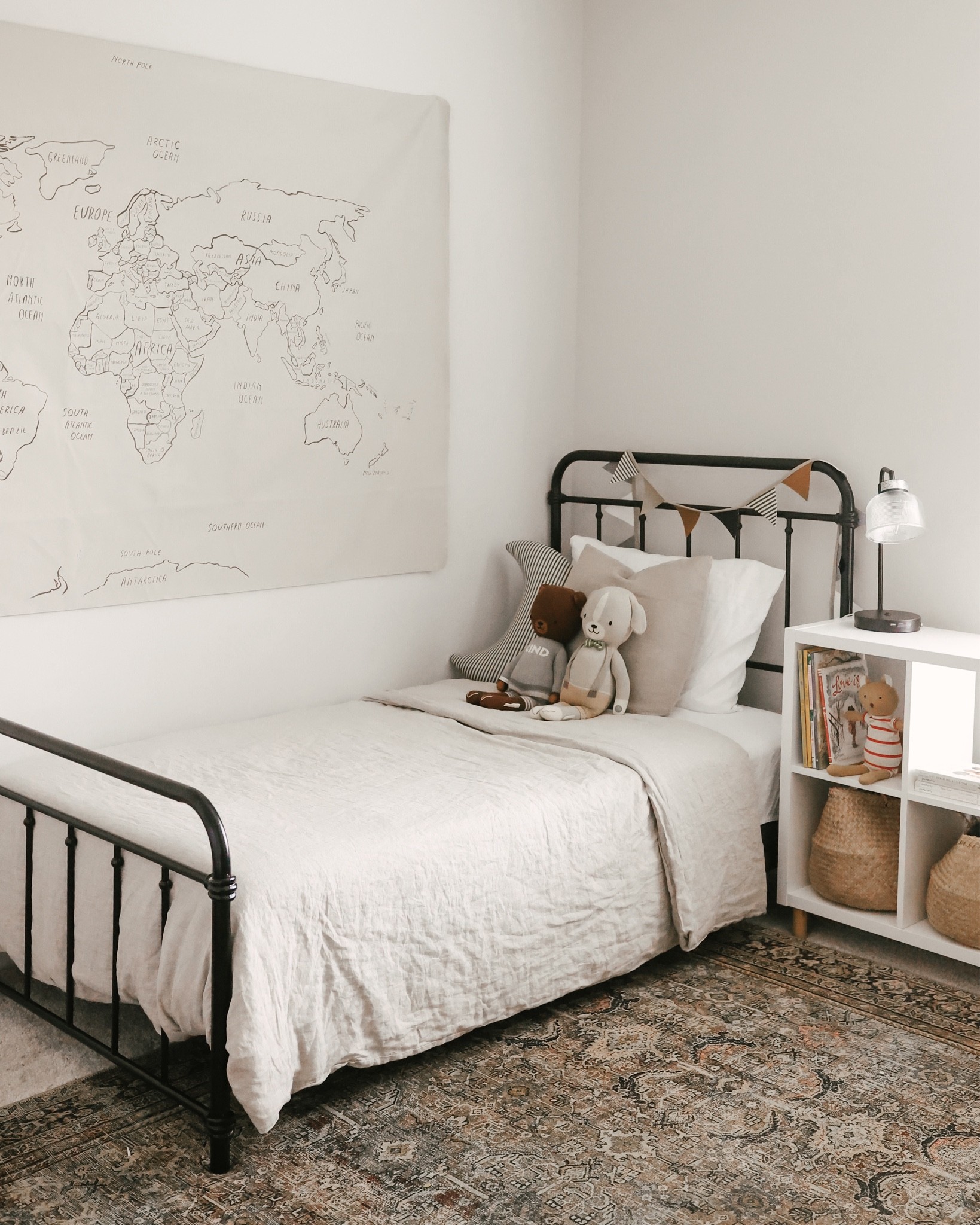 Boys neutral themed bedroom. Black metal bed, cubby storage, IKEA finds! 

#LTKfamily #LTKhome #LTKkids