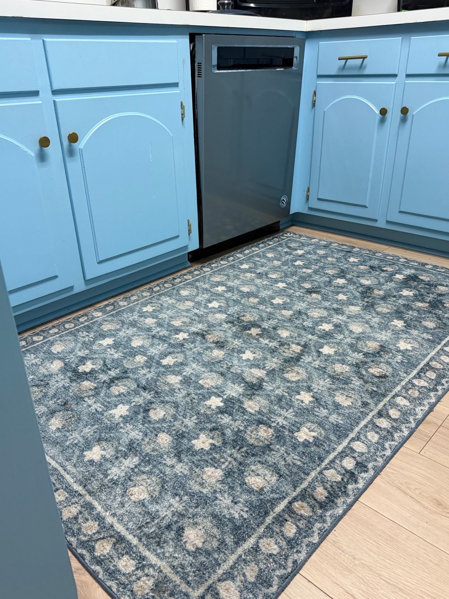 I love having this little rifle paper co rug in the kitchen.  It’s low pile so it’s easy to clean and it makes the space extra cozy 


#LTKHome