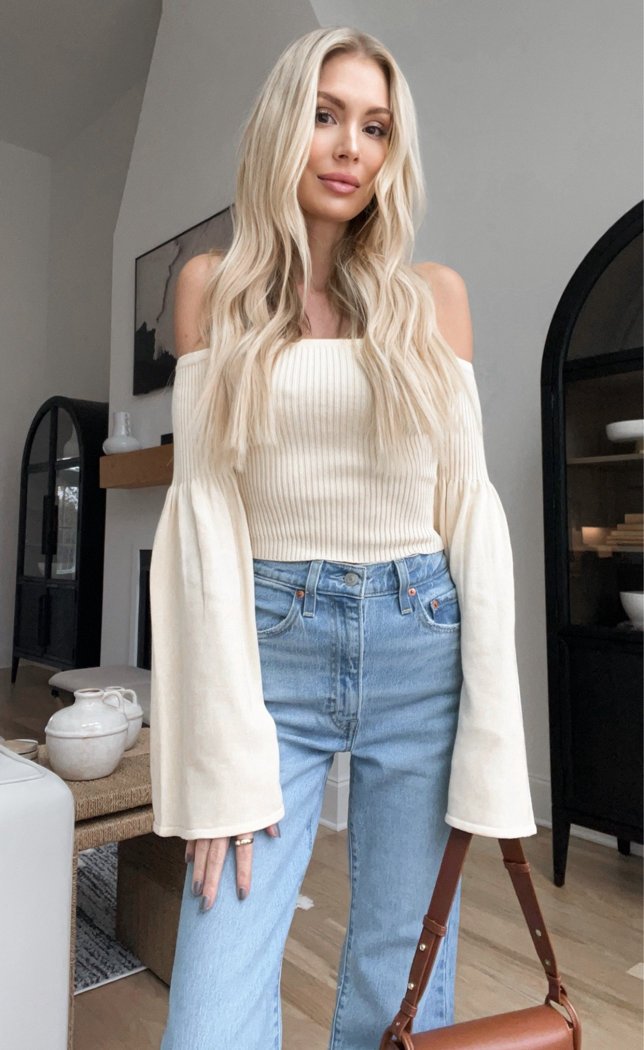 Off the shoulder sweater flare jeans spring clothing revolve sexy