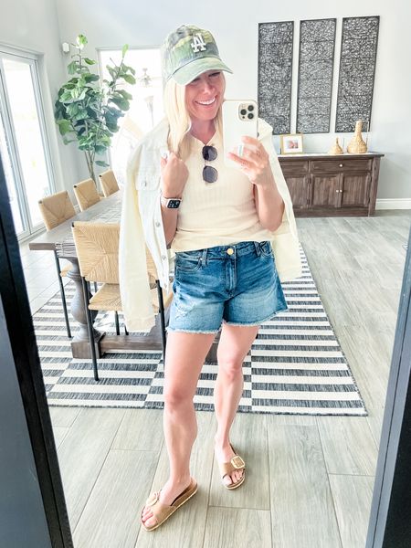 Love these Jean shorts with this cream, tank top and denim jacket, Birkenstock sandals, and a camo hat. Size extra small in the shirt and jacket and a chew in the shorts. Shorts run a little big I should’ve gotten the size small. Size 38 Birkenstocks. Evereve denim shorts spring outfit ideas

#LTKover40 #LTKSeasonal #LTKstyletip