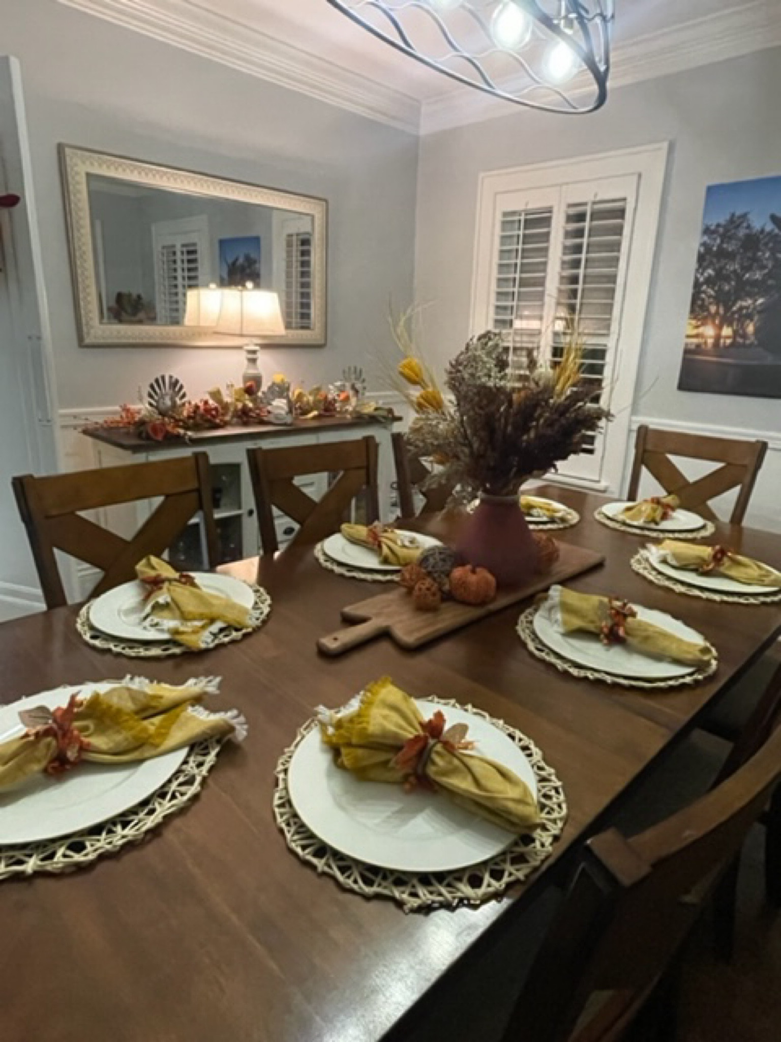 I love the transition into the fall season. Rustic place settings plus a pumpkin-adorned centerpiece accented with autumn brush help bring a touch of the season into my home.  

#LTKSeasonal #LTKHalloween