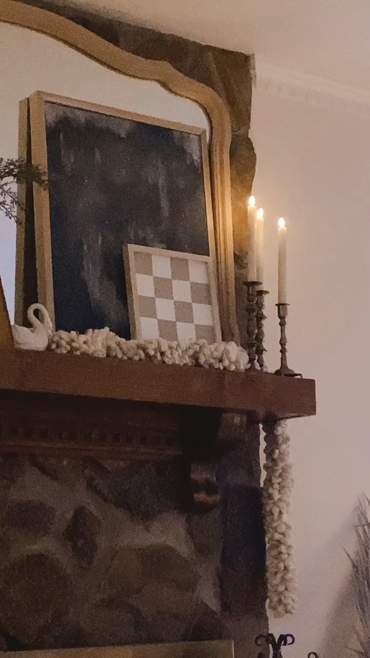 Viral real like flicker battery and remote candles. Taper candles with timer. Such a mood! Swan planter. Checkered painting. Fireplace decor. 

#LTKstyletip #LTKfamily #LTKhome