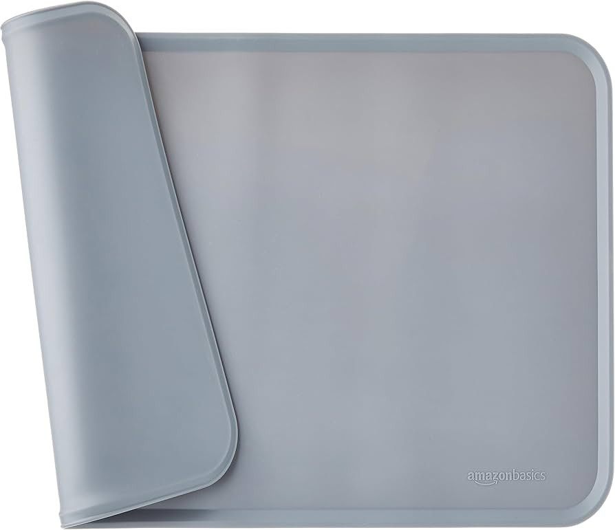 Amazon Basics Waterproof Anti-Slip Silicone Pet Food and Water Bowl Mat, Solid, 18.5 x 11.5 Inche... | Amazon (US)