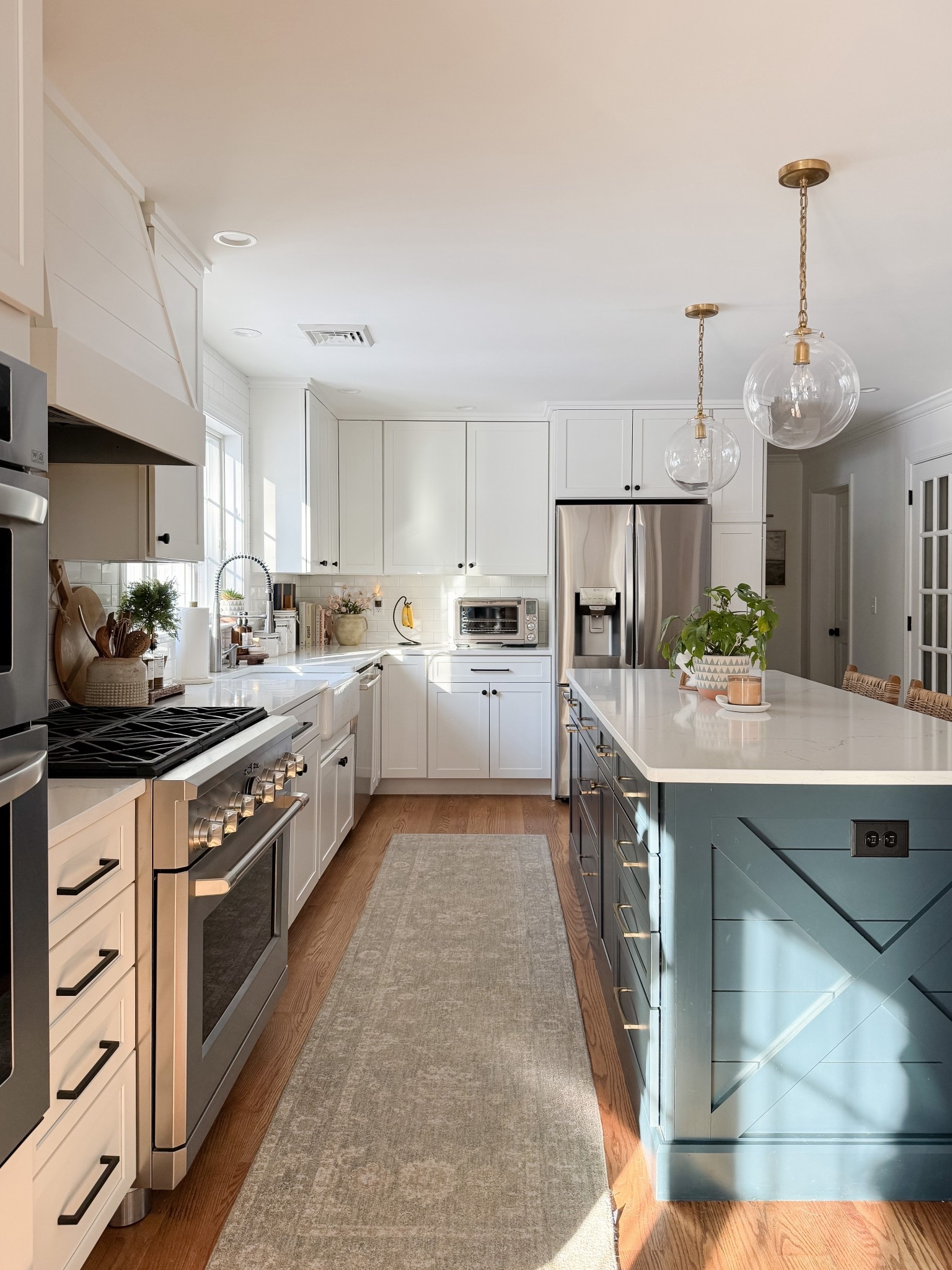 Coastal kitchen styled with navy island, white cabinets, neutral runner rug, and simple kitchen decor for a light and layered coastal space.

coastal kitchen decor, navy kitchen island, neutral kitchen runner rug, white cabinet kitchen, coastal kitchen styling, neutral kitchen decor, light coastal kitchen design, kitchen island runner rug, sherricalnanhome

#LTKHome