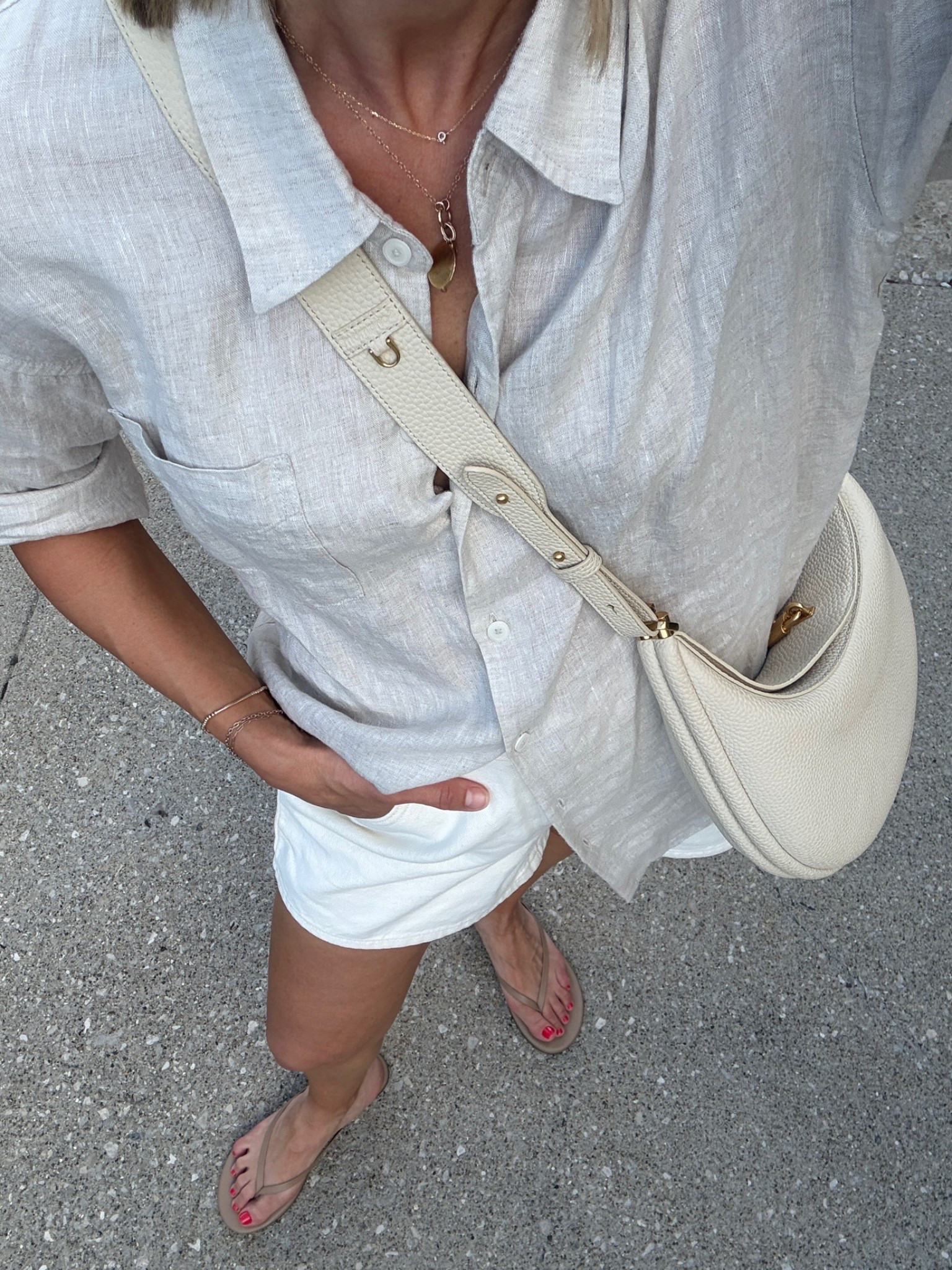 Wearing xs linen shirt, 26 cinch waist denim shorts, sandals tts