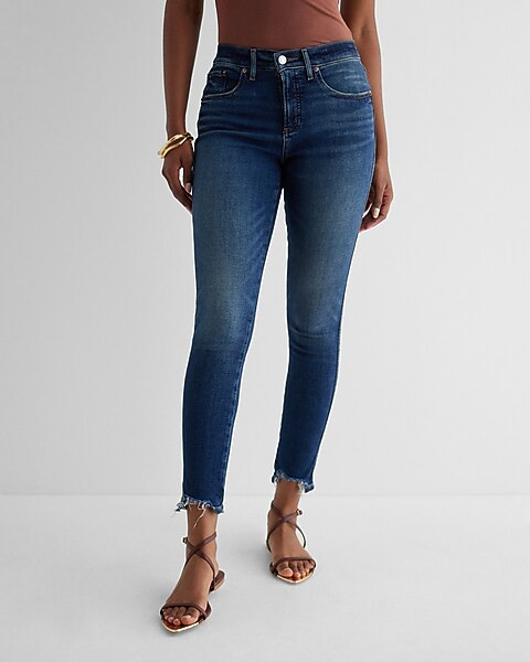 Mid Rise Dark Wash Raw Hem Skinny Jeans | Express