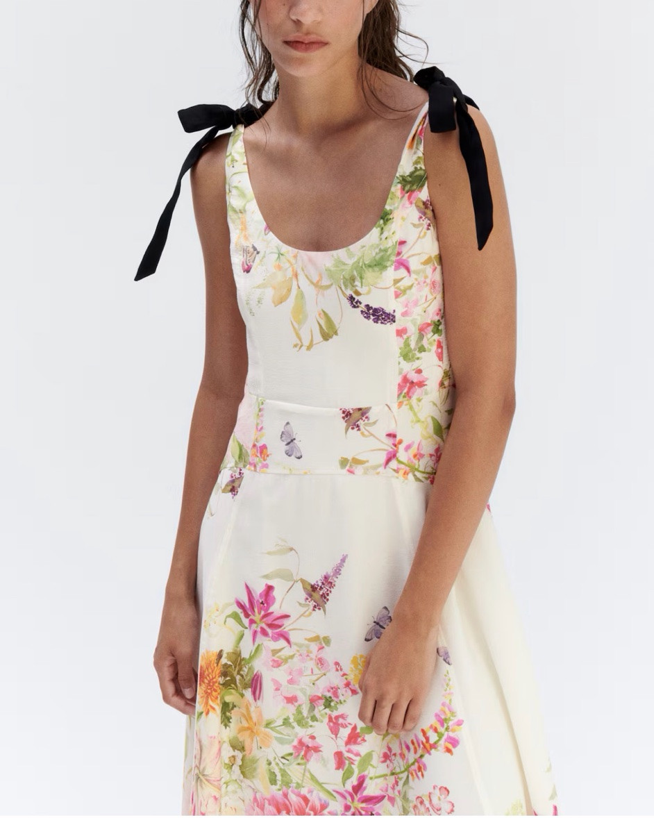 Floral midi dress with black bow details

#LTKSeasonal