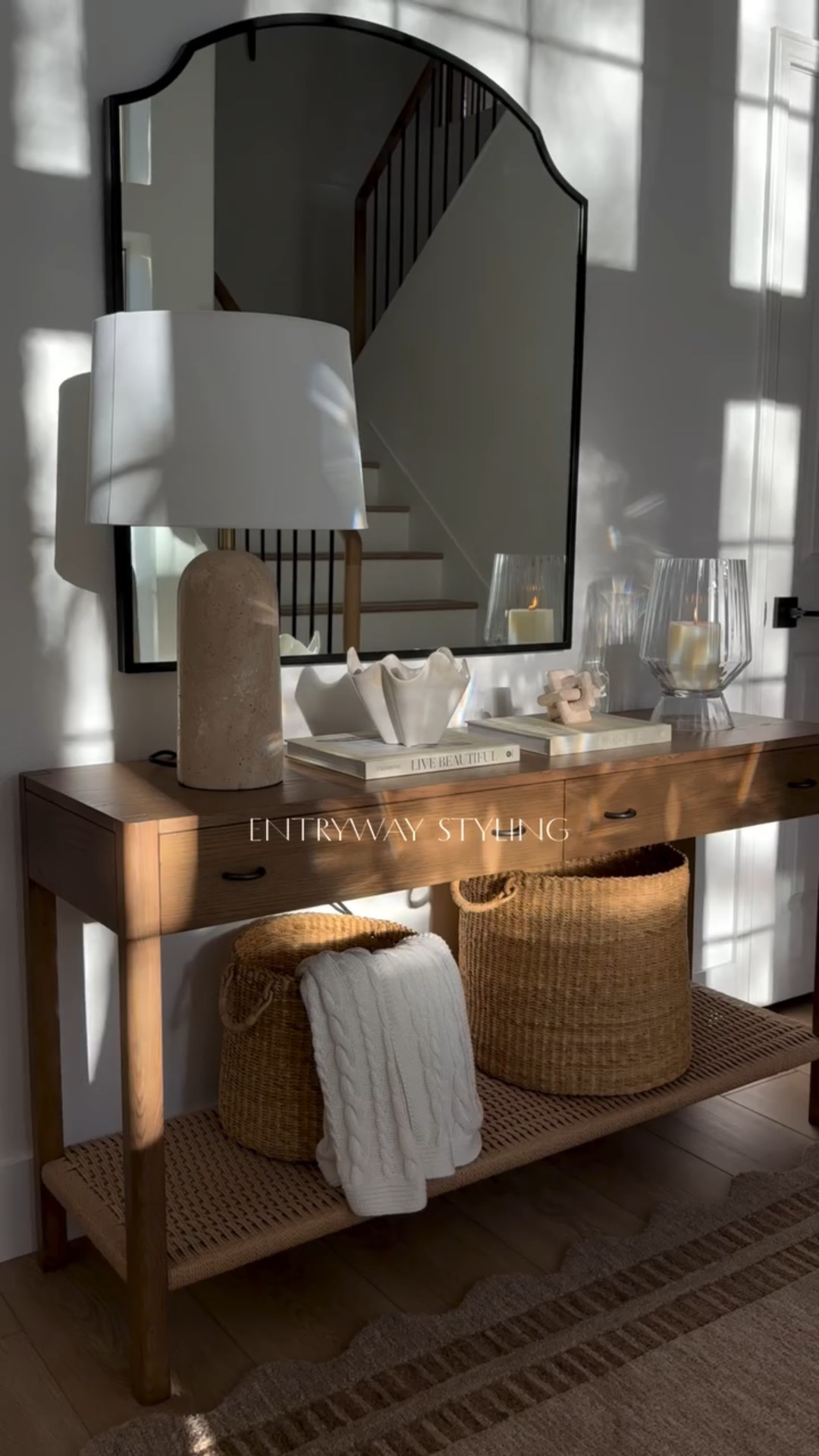 Entryway refresh ✨

This console table is a follower favorite. A warm, welcoming piece for the entryway.

For reference, my candle holder is 12” and the candle is ivory 4”x4.5”. 

Organic modern decor, travertine decor, earthy home decor, hurricane candle holder, storage baskets, table lamp, mirror  

#LTKU #LTKHome #LTKSeasonal