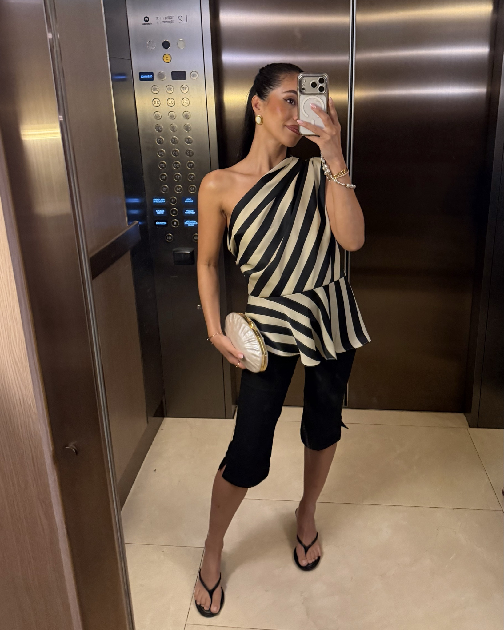 Evening outfit in HK 🖤 top from Mango wearing size M and 4th and reckless black capris 

#LTKdatenight #LTKspring #LTKstyletip