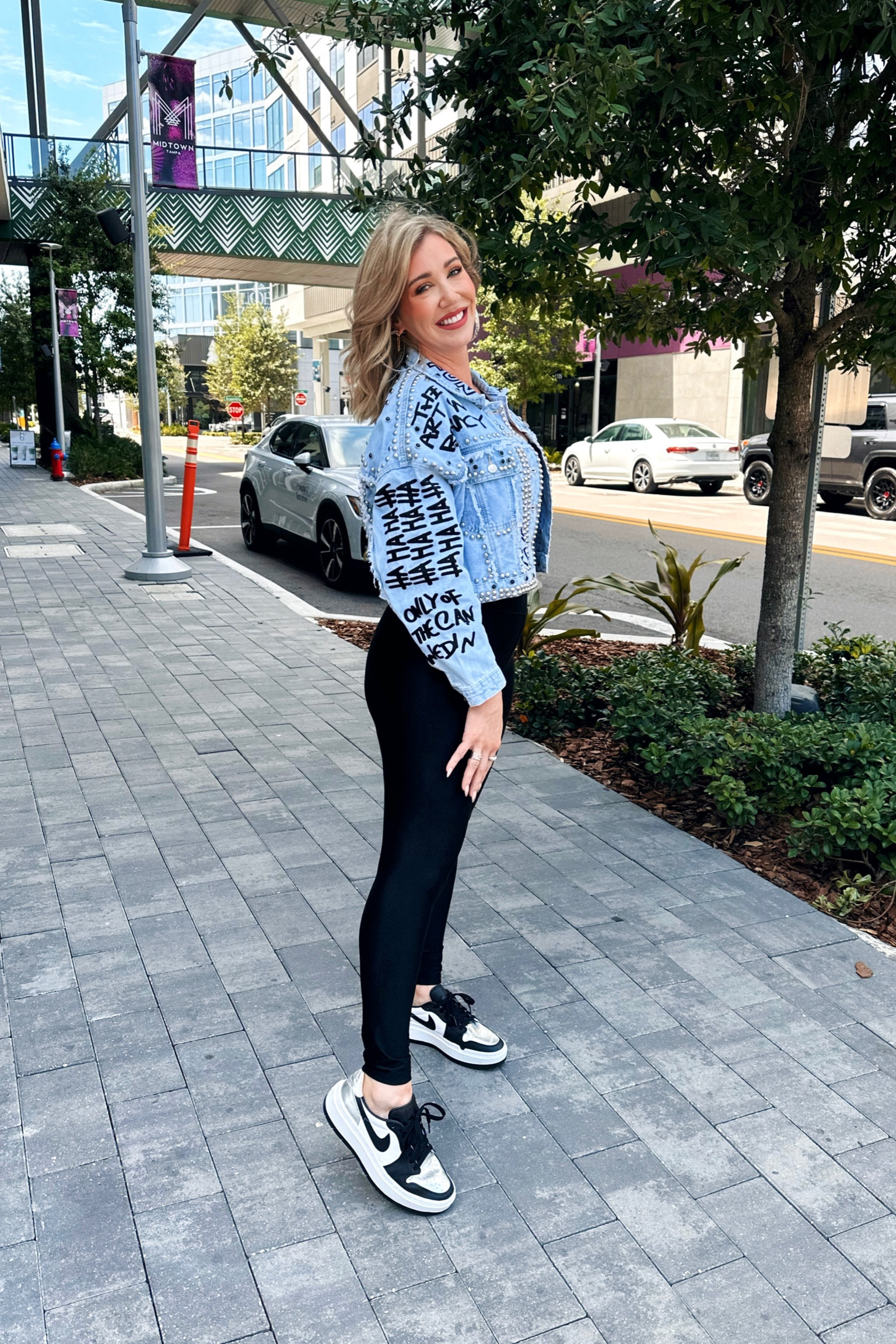 The details on this jacket are amazing!! All the studs and graffiti is so much fun!! 

These high waisted leggings have become a go to for me. They have a slight shine to them. High waisted and very flattering (and comfy!)

The tank is a perfect basic crop tank to go with high waisted leggings. Hits right at the top of the leggings. Doesn’t show my stomach and creates a smooth look. 

Wearing medium in everything

💋 lip is shade ‘outspoken’ 

#LTKfit #LTKunder100 #LTKunder50