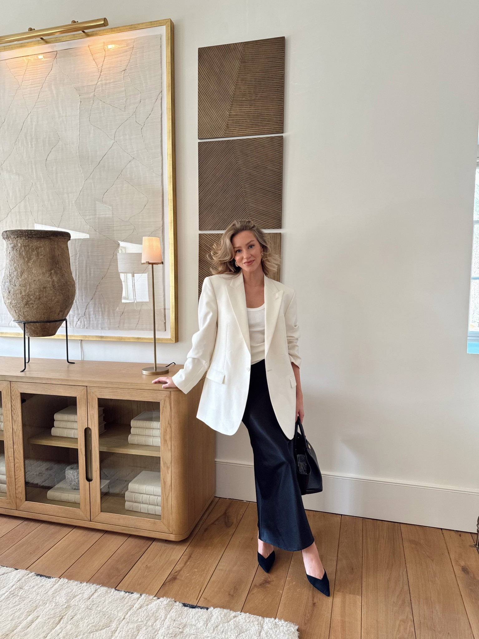 Spring outfit, workwear, satin skirt, cream blazer, white vest, sling back heels, black leather bag

#LTKworkwear #LTKuk #LTKspring