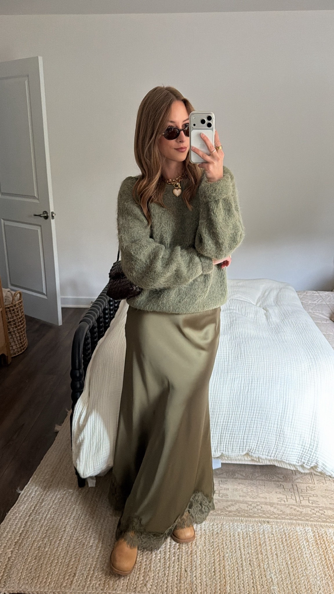 10/3/26 Anniversary Dinner Outfit 🍂🤎

Our last anniversary dinner before we get married next year 🥹🤎 Went a little elevated + fall for date night — wearing my green satin lace-trim Tuckernuck skirt (size 0) with Steve Madden Riggs boots + my older Loeffler Randall bag and Amazon sunglasses.
My NBY sweater is from American Vintage and unfortunately isn’t linkable, but I’ll add something similar! One of my favorite fall date-night looks lately 🍂

#LTKootd #LTKSeasonal