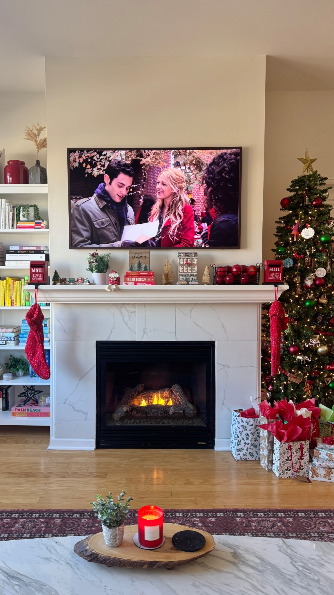 Have a holly jolly Christmas! Our cozy Christmas fireplace setup is my favorite. The frame TV is perfect for watching holiday episodes and the slim Christmas tree is perfect for our apartment! 

#LTKSeasonal #LTKHome #LTKHoliday