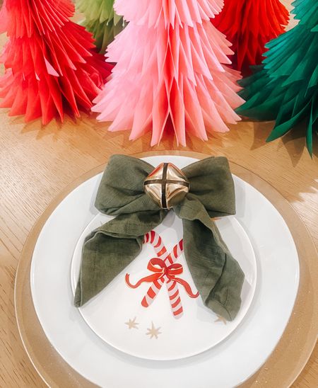 Christmas holiday table scape with a bow napkin design 

#LTKHoliday #LTKhome #LTKSeasonal