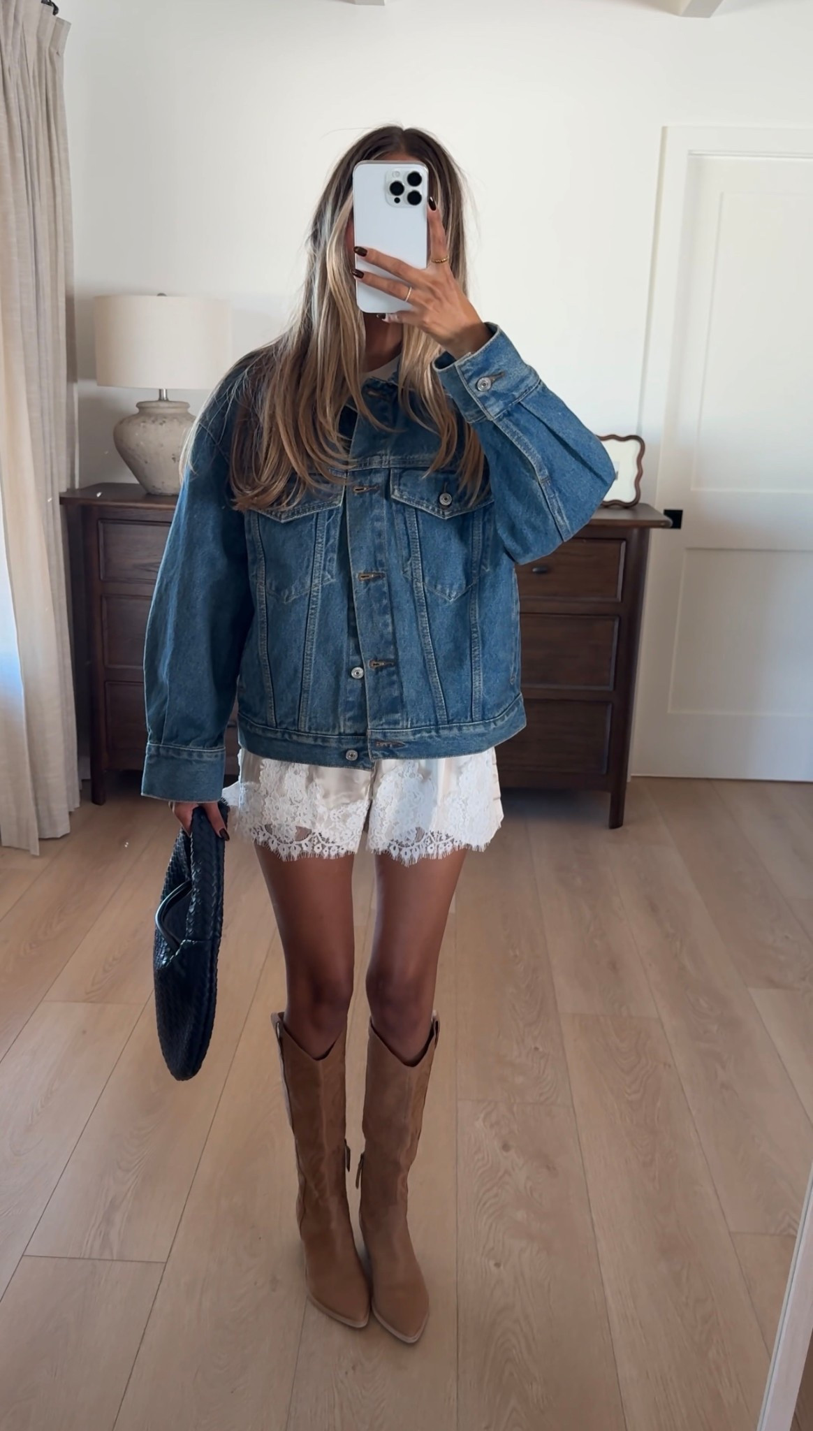Denim jacket meets lace moment 🤍 Loving the contrast of structured denim with these soft, feminine satin shorts and y'all suede boots. easy, effortless, and so good for those sunny fall days. 

#LTKfall #LTKdenim #falloutfit #neutralstyle #fallfashion

