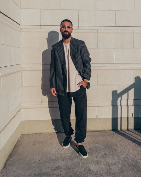SALE 🚨 FEAR OF GOD ‘The Suit Blazer’ in pinstripe Charcoal (size 48, linked same and alternative), Inside out Raw Neck tee in ‘Sand’ (size M), Loafers in black leather (size 41, linked similar and alternative) and FEAR OF GOD x BARTON PERREIRA glasses in ‘Matte Taupe’ on sale up to 50% Off through Black Friday, Cyber Monday and Cyber Week. A relaxed and elevated men’s casual outfit perfect for Fall and Winter. Complete the look with the ESSENTIALS sweatpants in ‘Black’ (size M). 

#LTKsalealert #LTKmens #LTKstyletip