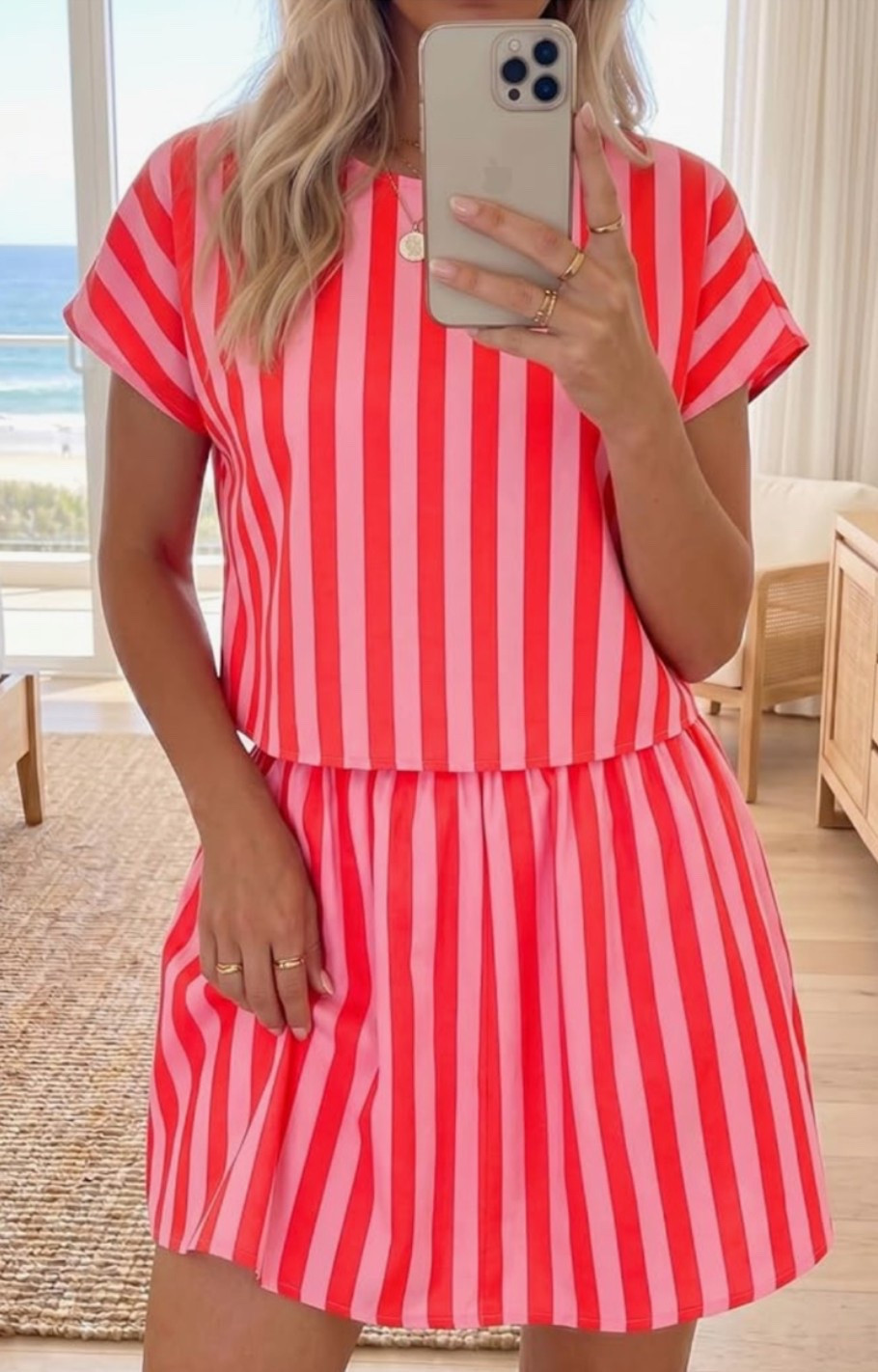 The striped matching set that was made for summer adventures. 🏖️ Perfect for vacation days, beach towns, sightseeing, resort mornings, coffee runs, travel outfits, and casual lunches by the water. The crop top and skort combination keeps it playful, comfortable, and easy to wear while still looking polished and put together. 

Just add sandals, a straw bag, and your favorite sunglasses for an effortless coastal summer look. 💖

#LTKOver40 #LTKTravel #LTKMidsize
