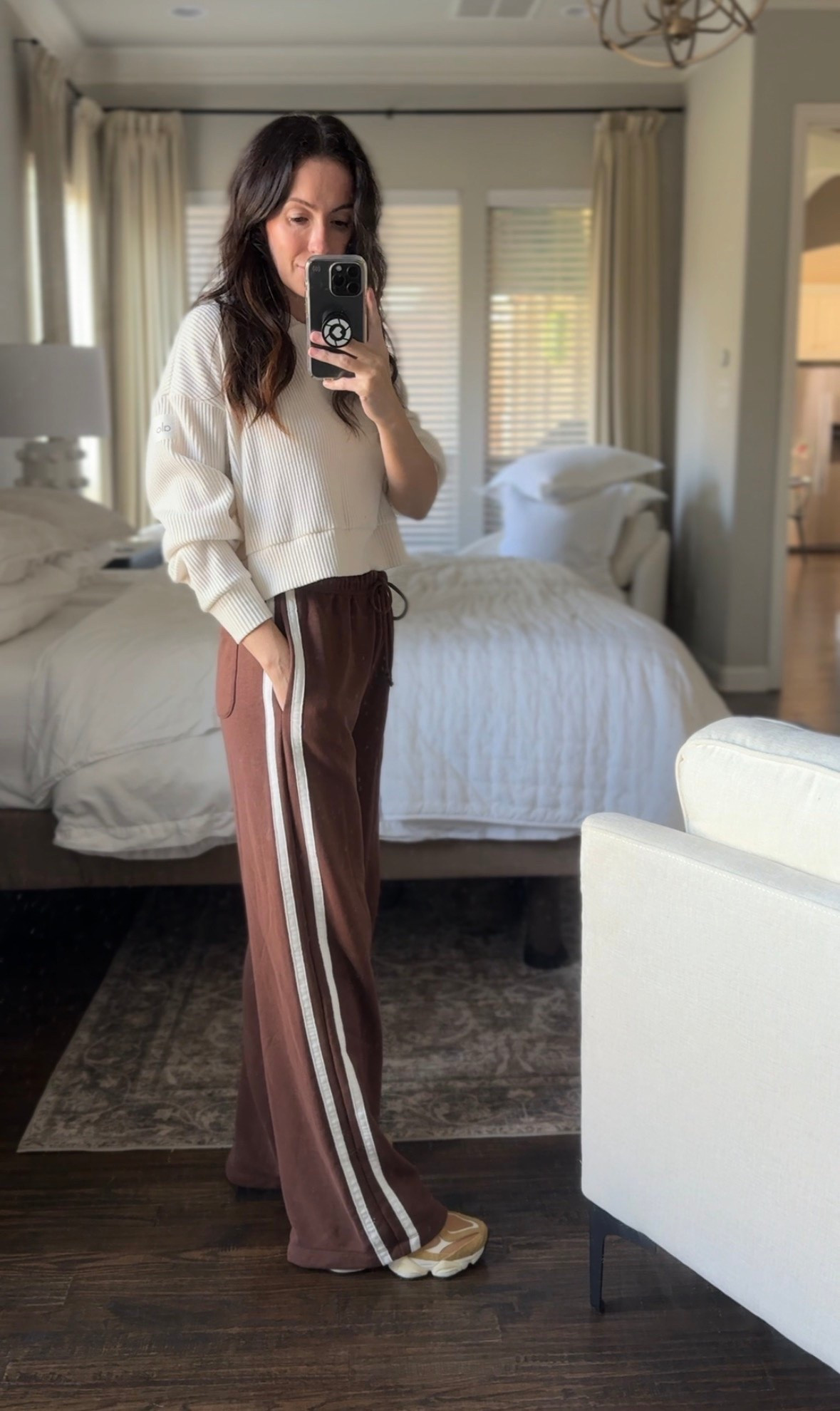 The viral Target track pants are so comfy! I wore them today to run errands and pick up Millie from school. 12/10. They fit true to size, but for my shorter girls they may be a little long. I’m 5’2, and I have them tied up high. #targetfashion #trackpants

#LTKOver40 #LTKPetite #LTKmomlife