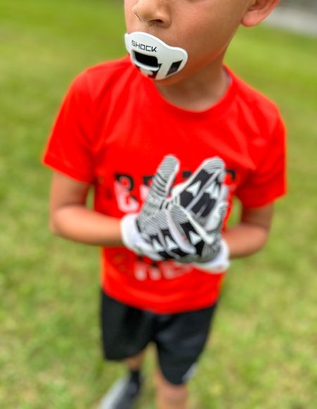 Our son started flag 🏈 football and he is loving it. New Shock Doctor Mouth Guard, gloves and cleats. #mouthguard #gloves #flagfootball #football #sports #kiddos #cleats 

#LTKkids