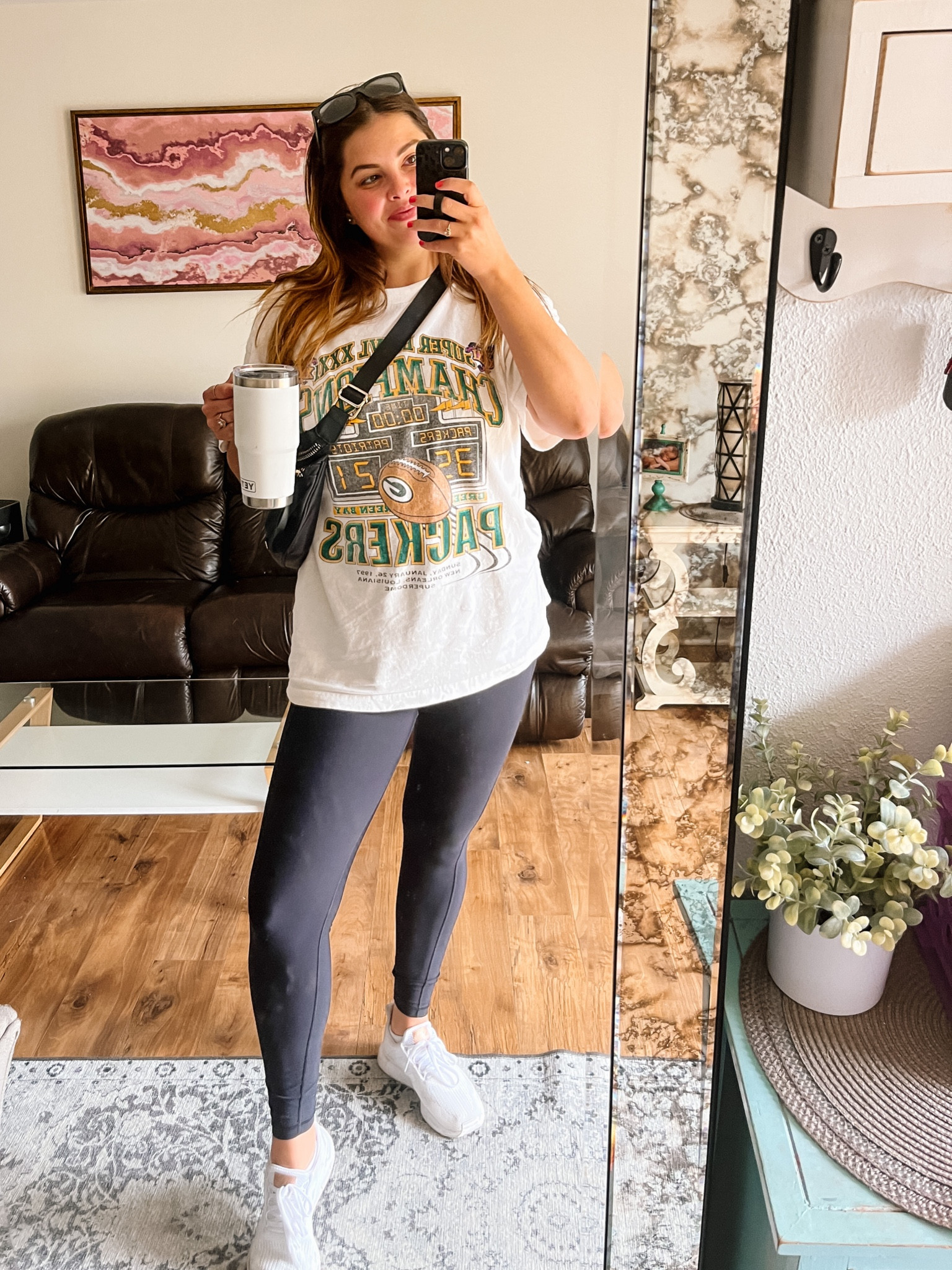 vintage nfl packers tshirt, black leggings & sneakers!  

#LTKfindsunder100 #LTKmidsize #LTKfindsunder50