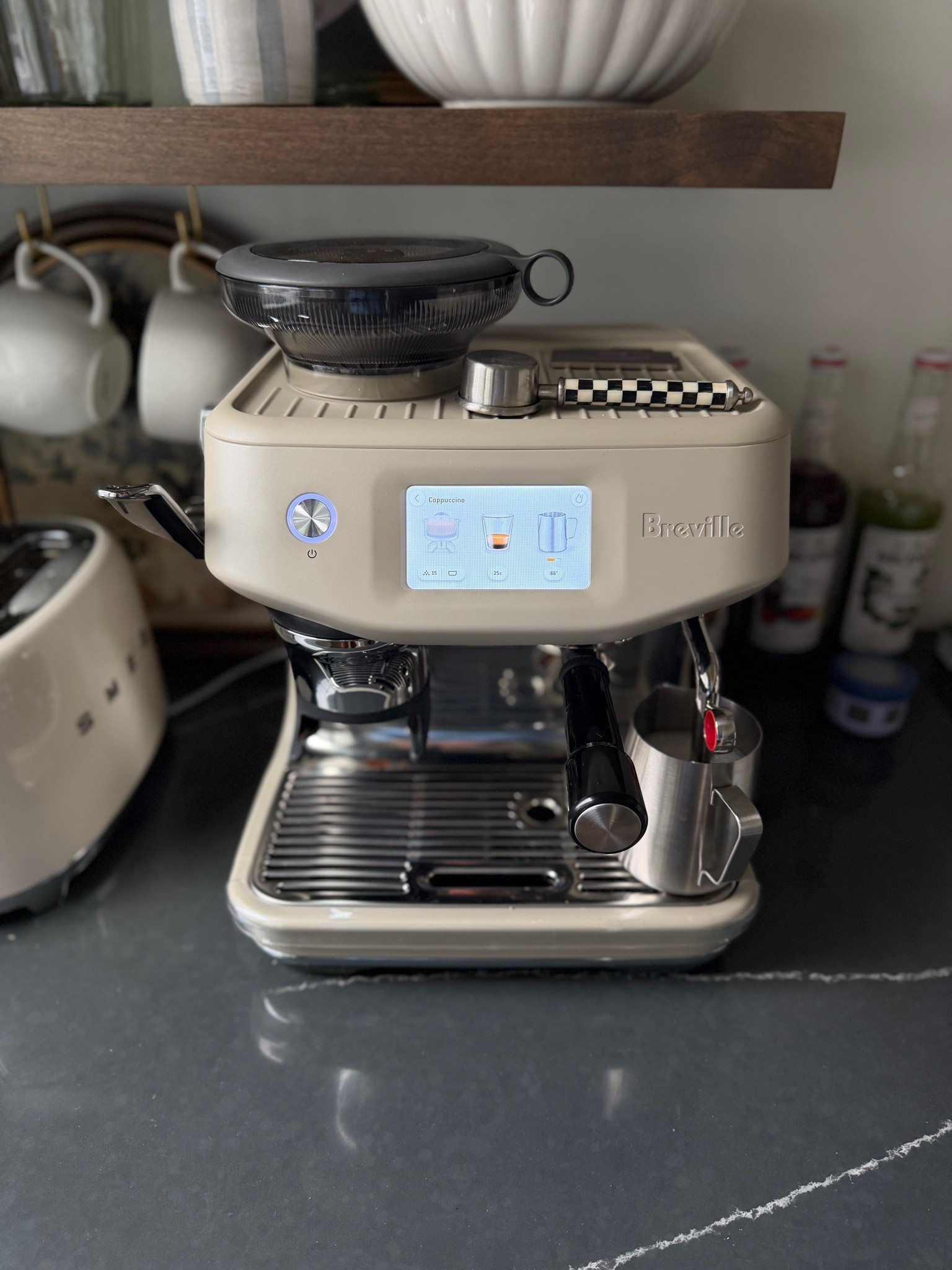 I upgraded to this Breville for Mother’s Day and I love it so much! It’s more automated and froths your coffee for you. Tastes like a coffee shop!

#LTKHome