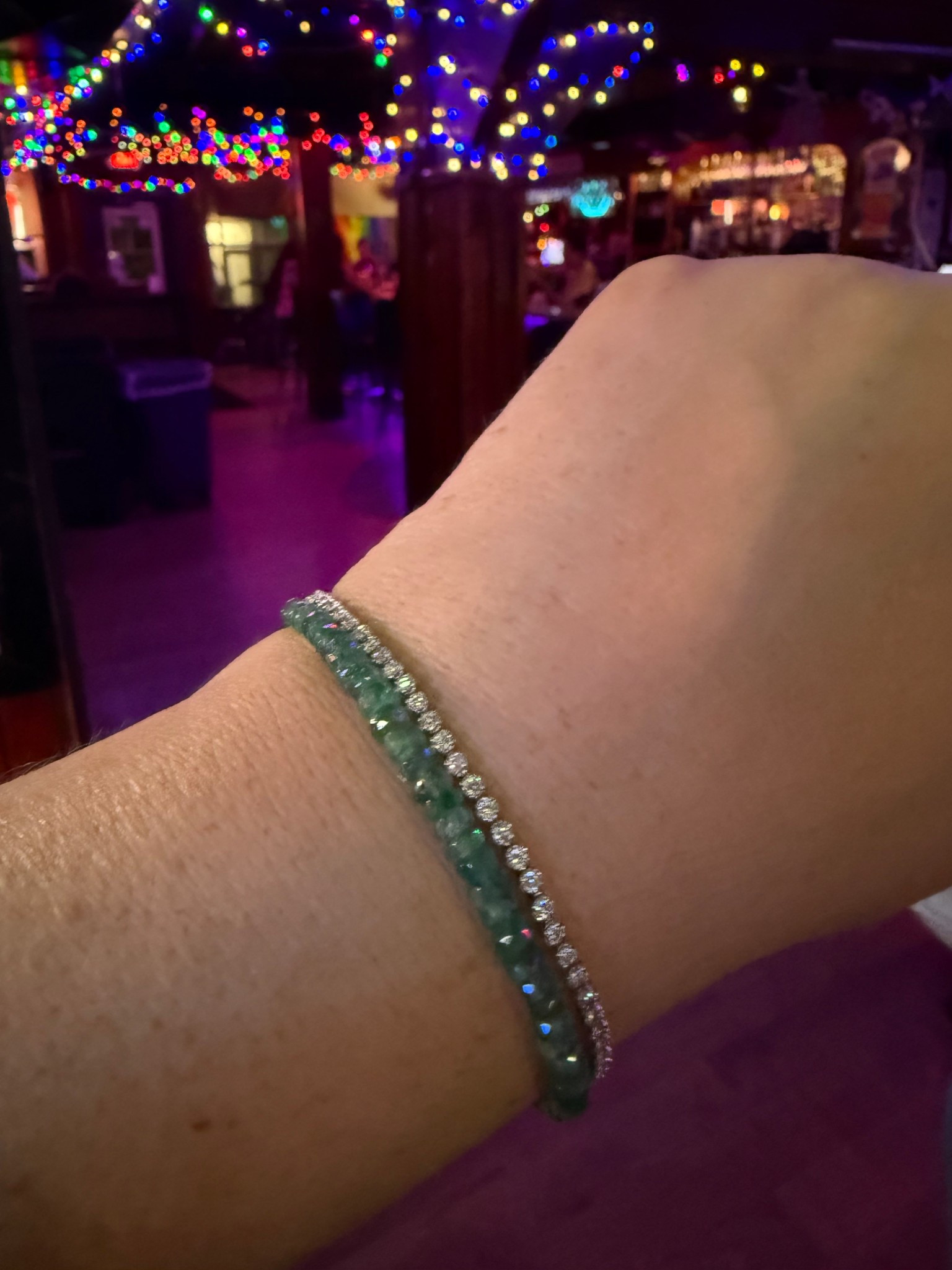 I didn't know a gemstone bracelet like this could sparkle so much. The JiaJia emerald bracelet is gorgeous. While it was gifted to me, I loved it so much I bought the necklace version and another one. Their gemstone creations are so unique and works of art. 

Bracelet is 1 ct petite tennis bracelet from quince and I love it! 