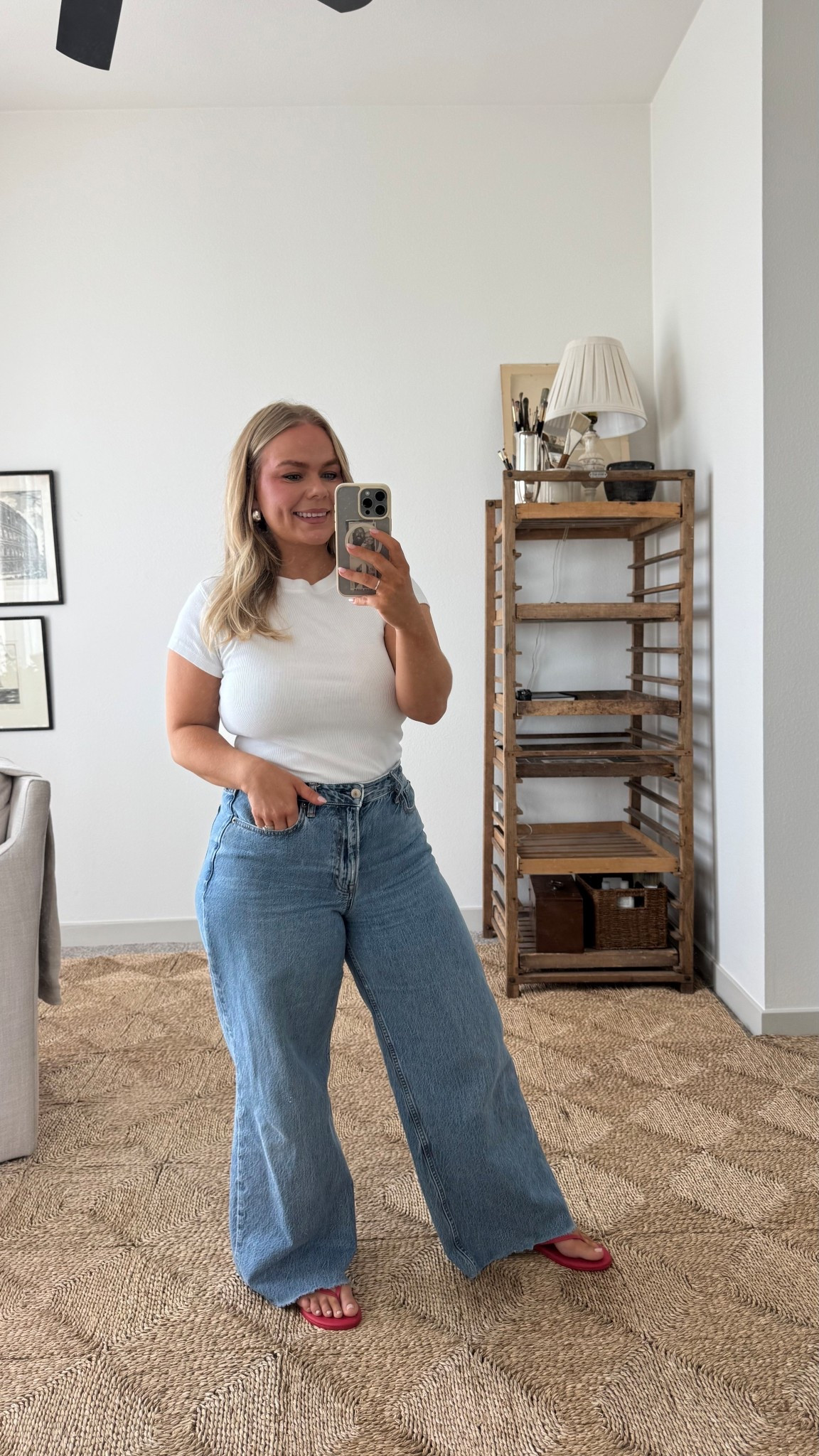 LOVE a pop of red lately! So effortless. I’m in size M in top. Size 29 in jeans and sandals fits tts.