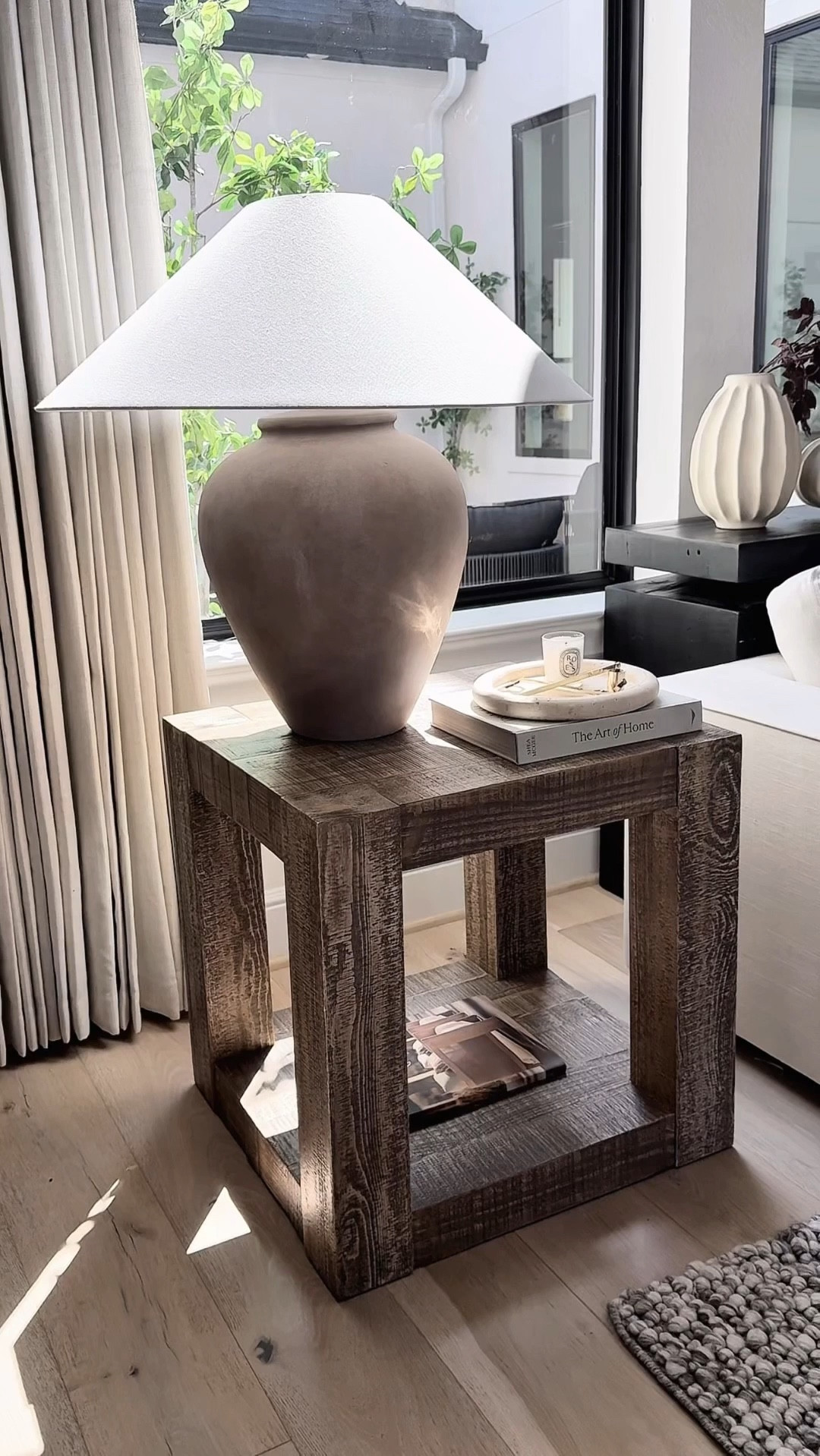 Super obsessed with all my amazing finds from Wayfair! My gorgeous lamp is perfect to style in your living room, bedroom, and entryway! 🤎

My console table is a minimalist dream—clean lines, natural wood, and just the right vibe for my entryway. I love how it sets the tone the moment you walk in. Effortless and elevated. 

Obsessed with this textured neutral rug—such a cozy and timeless foundation for my sitting room. It adds just the right amount of warmth and style without overpowering the space. Love how it pulls everything together! 

This chunky wood dining table is everything—bold, simple, and timeless. I love how it anchors my dining nook with a natural, grounded vibe. Perfect for everyday meals and cozy gatherings.

Last but not least, my bathroom vanity and tiles are a match made in heaven, creating a serene spa-like atmosphere. I’m completely obsessed with how everything turned out!. 

Shop now!#LTKStyleTip 

#LTKHome #LTKSaleAlert