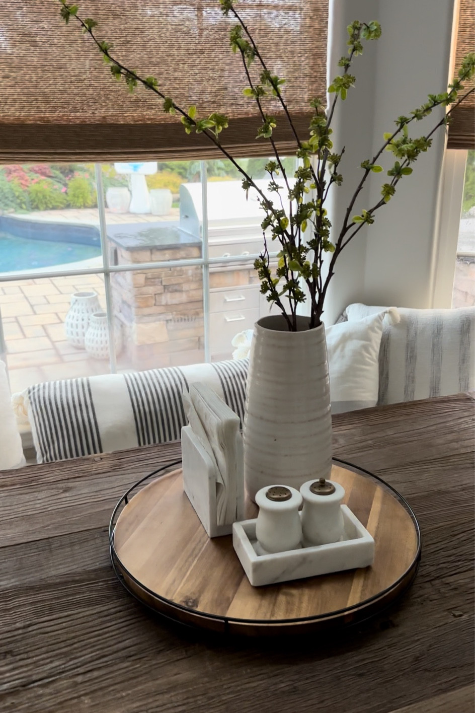 Kitchen table styling 
Marble salt and pepper shakers. Marble napkin holder. Ceramic vase. Lazy Susan. Faux greenery.

#LTKhome