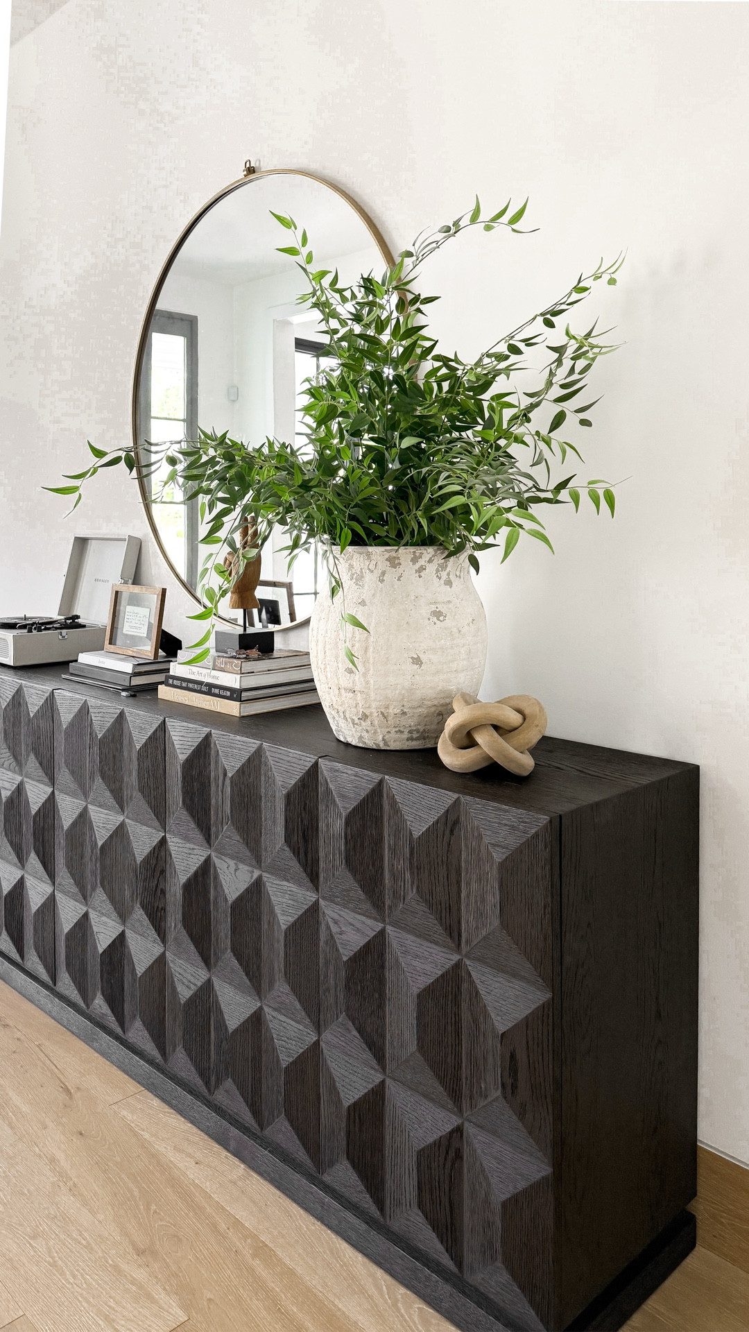 One key element that I recommend looking for when purchasing artificial stems is the shape that they create.  When they naturally want to hang or drape over the edge of a vase/vessel (and in an asymmetric shape), it creates a more realistic look.  

#LTKHome #LTKOver40