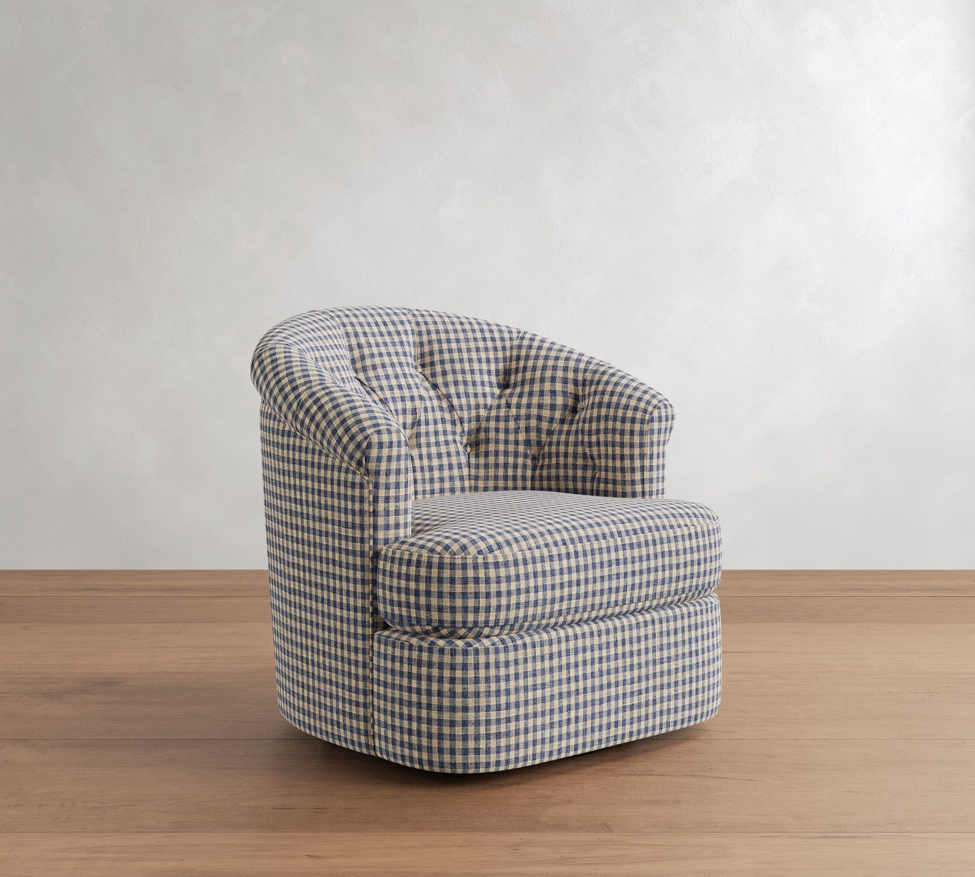 Sutton Tufted Upholstered Petite Swivel Armchair, Polyester Wrapped Cushions, Rustic Gingham Print Navy | Pottery Barn (US)