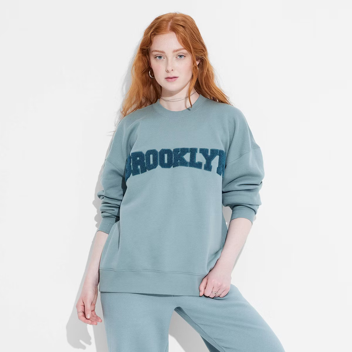 Women's Oversized Graphic Sweatshirt - Wild Fable™ Turquoise Blue S | Target