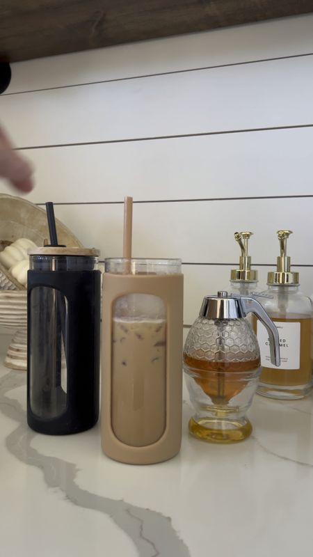 Coffee bar favorites amazon finds love these glass tumblers with silicone cover and wood lids! They are super durable and perfect for iced coffee, tea water etc. honey and maple syrup dispenser coffee syrup pumps bottles home decor kitchen accessories conuntertop accents 

#LTKfindsunder50 #LTKhome #LTKstyletip