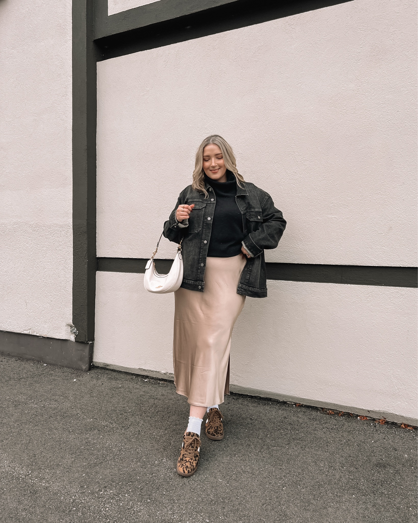 Midsize fall date night outfit - Wearing my usual size L in the satin midi skirt (50% off!) Sized up to XL in the black turtleneck but could have done my normal L (50% off!) My black denim jacket is from the men’s section, wearing XL. My leopard print sneakers are from Call it Spring, linked similar 


#LTKautumn #LTKsale #LTKmidsize