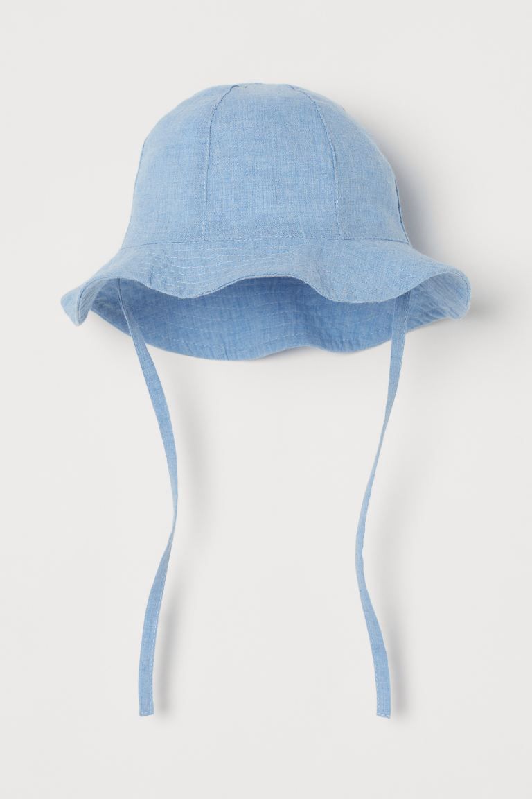 Sun hat in airy, woven cotton fabric. Wavy brim and ties underneath. Lined.
	CompositionCotton 10... | H&M (US)