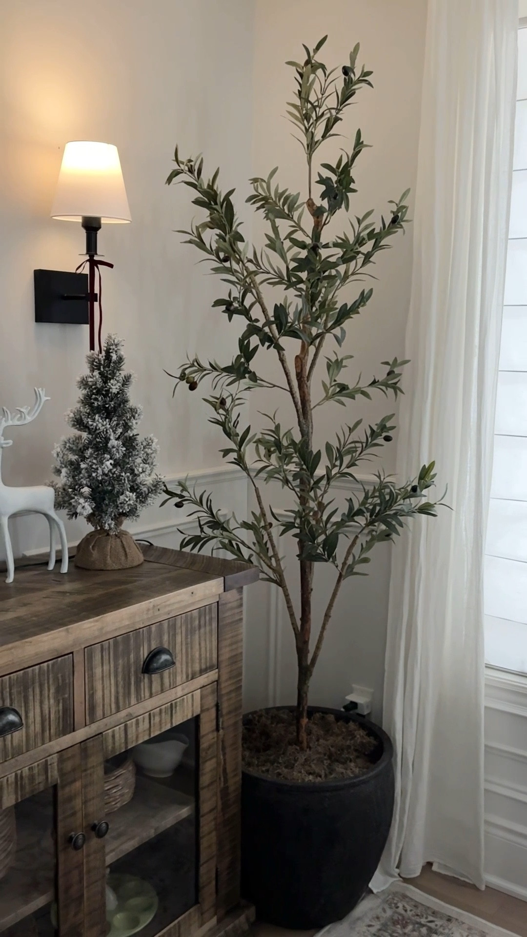 Potted faux olive tree on sale for Boxing Day! 
I have the 6ft and raised it up in my pot with boxes, cardboard & added moss to cover  


#LTKhome #LTKcanada #LTKsale