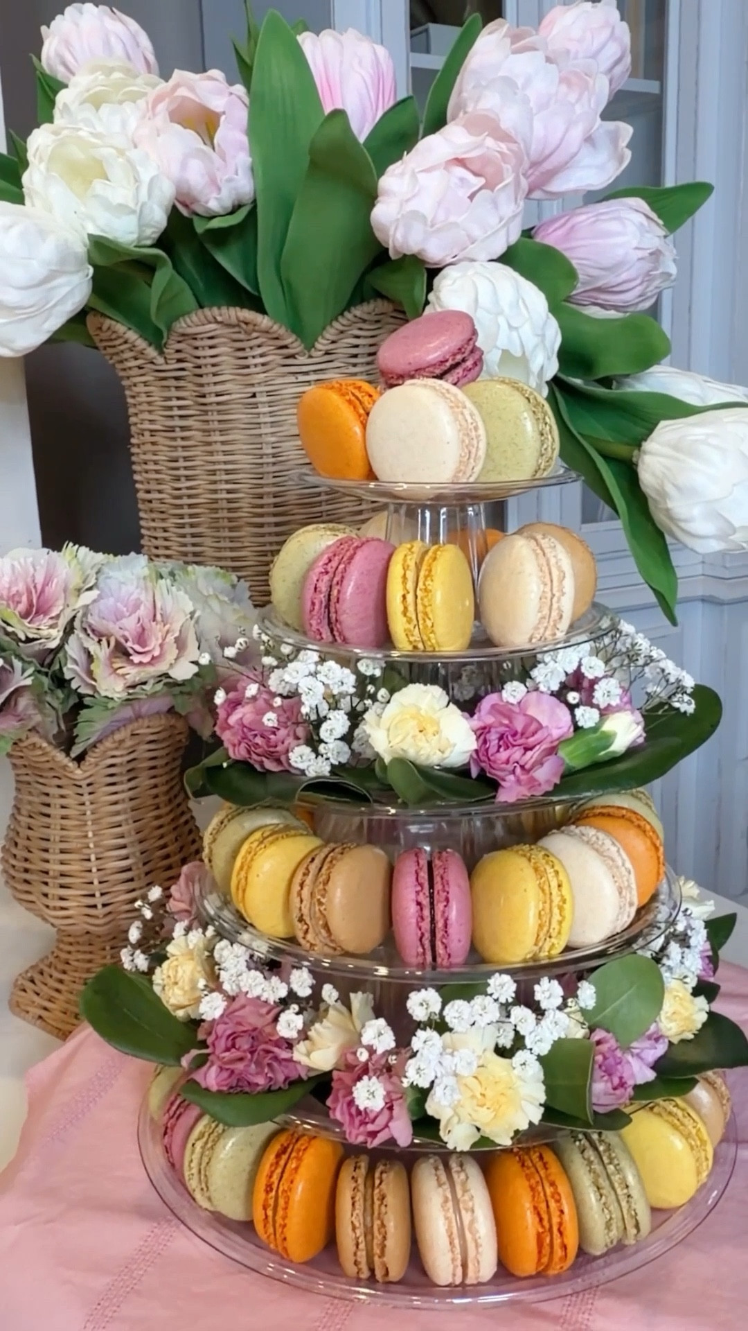 Floral Dessert Centerpiece 🌸One of my favorite little hosting tricks. Layer macarons on a tiered stand and tuck soft florals and greenery between the plates. Instantly it looks like a professional dessert display and floral arrangement all in one — but it’s actually so easy to recreate.

Perfect for Easter brunch, bridal showers, garden parties, or a little Bridgerton-inspired tea moment. Your centerpiece doubles as dessert, and guests can simply grab a macaron as they mingle.

Pretty, effortless, and such a fun way to make your table feel extra special.

#LTKSeasonal #LTKHome #LTKfoodie