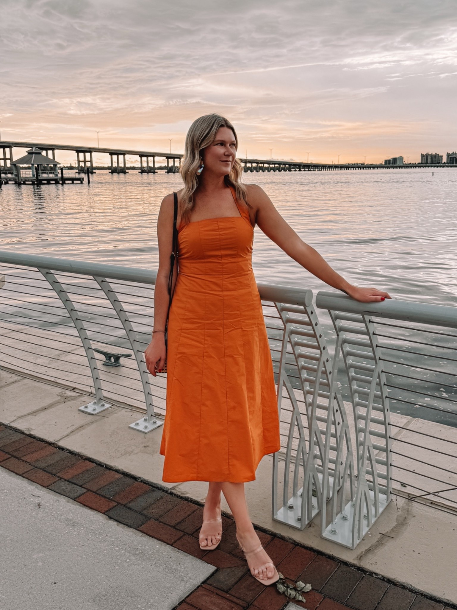 Add a pop of color to your wardrobe with this BEAUTIFUL orange halter dress, one of my favorite summer dresses for vacations, date nights, or anywhere in between

#LTKootd #LTKOver40 #LTKTravel