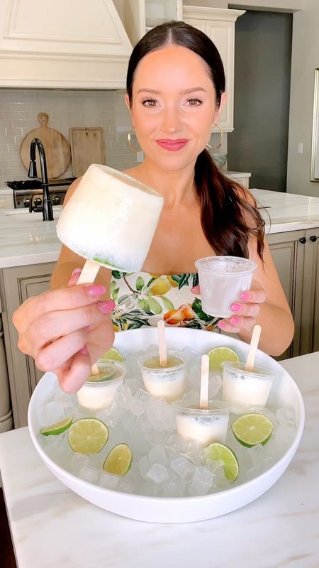 Who here loves margaritas? Try these boozy popsicles for memorial day weekend, your next summer party, or weekend by the pool! 🍋‍🟩

I was inspired by @champagneang to make these but with a creamy twist!

INGREDIENTS:
- 52oz Limeaide
- 1.5 cups Tequila
- 1 cup Triple Sec
- 14oz can Sweetened Condensed Milk
- Freshly Squeezed lime juice to taste
- Limes Sliced to garnish
- Salt to garnish

Makes about 12-16 popsicles 

TIP: You have to move quickly with this recipe before the drink mixture separates. Prep lime slices and popsicle sticks before making drink mixture. Blend all ingredients in a large pitcher or blender. Pour into 5.5 oz Dixie Cups. Place Popsicle stick thru lime and place into cups. Sprinkle with salt. Freeze immediately before liquid starts to separate.

#margaritarecipe #margaritas #cocktailrecipes #boozypopsicles #popscicle #bacheloretteparty #summertreats

#LTKParties #LTKSeasonal #LTKHome