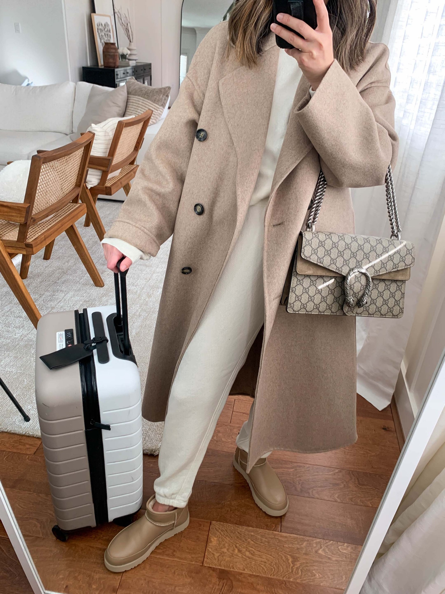Travel airport style. Airport travel outfit ideas. Comfy travel outfits. My favorite sweat set. 

Coat - Mango xxs
Sweatshirt - Jenni Kayne small
Sweats - Jenni Kayne xs
Boots - Ugg Classic Sugar Mini 5
Bag - Gucci small
Carry on - Away