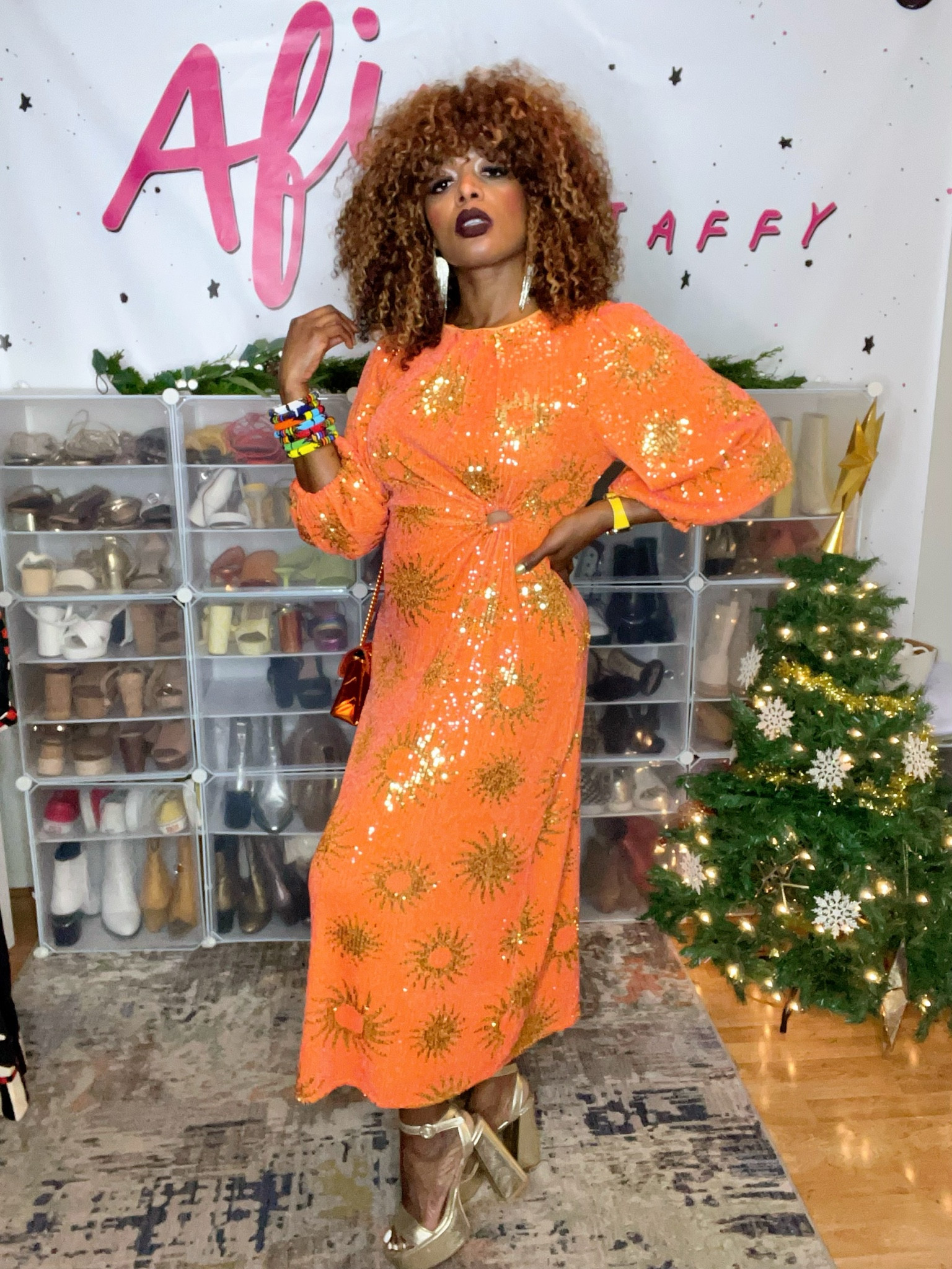 What I’d wear to a winter Gala!
This dress is just everything & let’s be honest we all need a “wow” factor dress in our closets & this is it! I love the cut out keyhole, the sequins texture & the gold sun bursts throughout this orange material! Light weight & paired with chandelier earrings lots of gold jewelry & heels & were good!

#LTKparties #LTKHoliday #LTKSeasonal