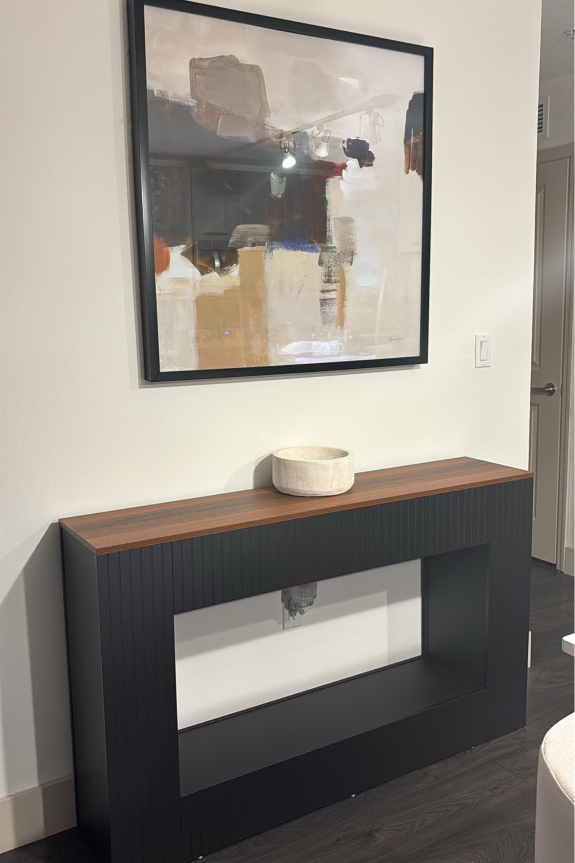 We finally have a new entryway table and I’m in love! When I saw the brown table top I knew it would go perfectly with the artwork I picked up last month! @wayfair #wayfair #wayfairpartner

#LTKHome