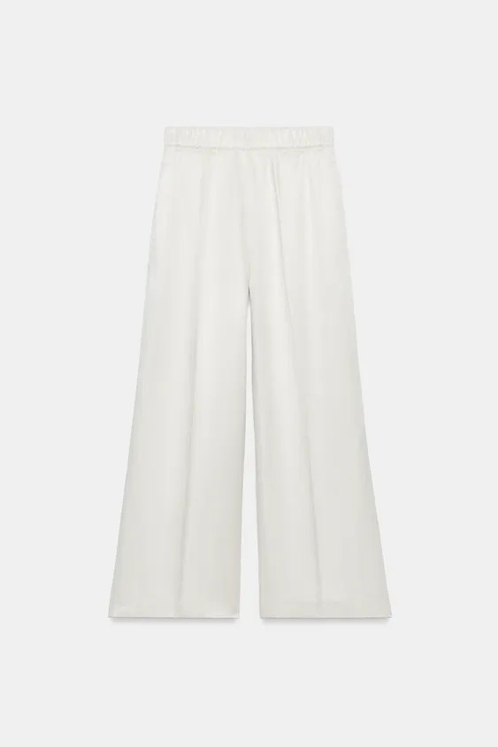 Model height: 181 cmZARA WOMAN COLLECTIONPants made from a viscose and 13% linen blend yarn. Mid-... | Zara Canada