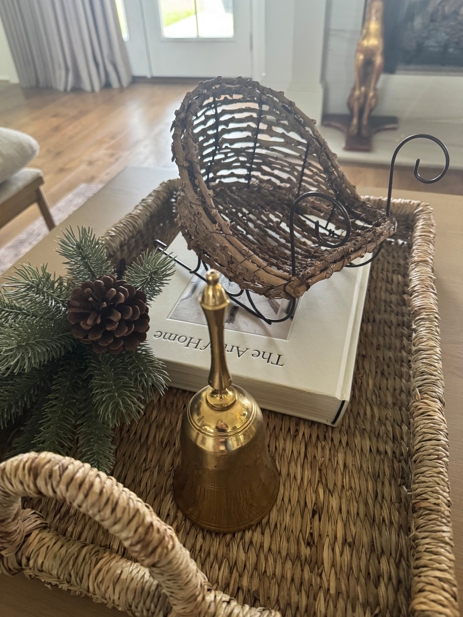 Coffee table decor.. cutest way to display Christmas cards is putting them out in this sleigh for all to grab and look at as they sit in your comfy living room around the tree! 

#LTKHoliday #LTKHome