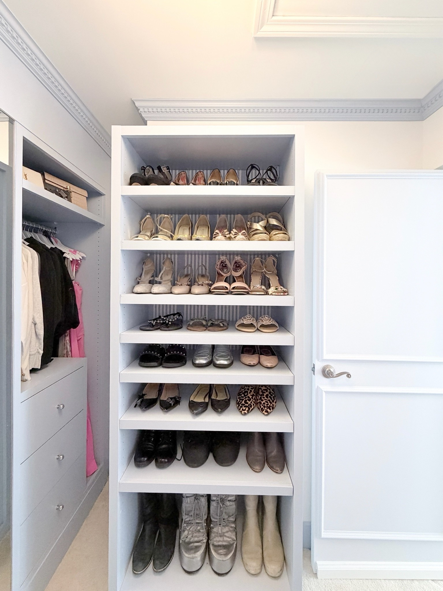 A little look at my DIY walk in closet makeover using the Ikea pax system & adding wood face frame, light blue paint, striped wallpaper lining for the backs & polished nickel hardware. The shoe tower is the 29” and holds 3-4 pairs of size 8.5 shoes on each shelf. The other wardrobe is also 29” but in the deeper size & has a spot for long hanging clothes, as well as large drawers, an area for sweaters & a shelf above for additional storage. I also swapped the hanging rods to metal ones & it feels so luxe.

#LTKHome
