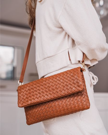 The cool thing about this bag is that it’s convertible. It’s both a clutch and crossbody…thanks to the removable and adjustable strap. The leather is A++ quality and the woven detail is something you’d see in a designer Bottega Veneta bag with a higher price tag. Even the minimal gold hardware was right on point.

~Erin xo 

#LTKItBag #LTKSeasonal #LTKFindsUnder100