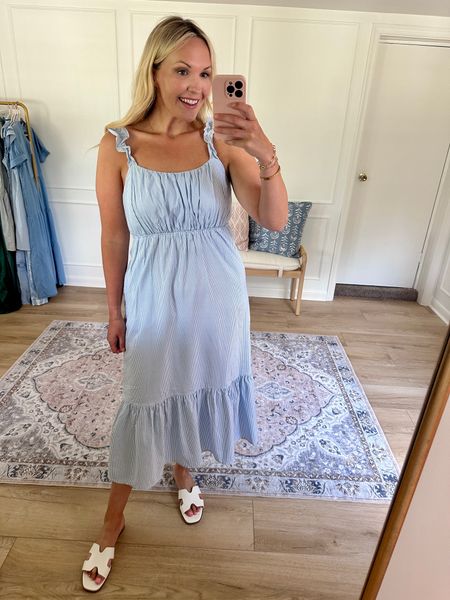 Affordable and comfy stripped maxi dress. I’m wearing a med! Has pockets and a stretchy top! Summer dress / summer outfit 

#LTKMidsize #LTKxWalmart #LTKStyleTip